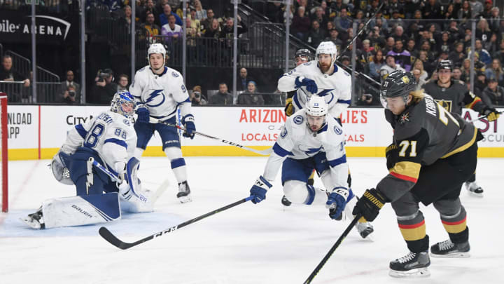 William Karlsson #71 of the Vegas Golden Knights skates with the puck against Cedric Paquette #13 and Andrei Vasilevskiy #88 of the Tampa Bay Lightning. (Photo by Ethan Miller/Getty Images)