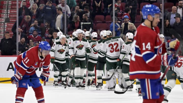 Oct 17, 2023; Montreal, Quebec, CAN; The Minnesota Wild celebrate the win against the Montreal Canadiens at the Bell Centre. Mandatory Credit: Eric Bolte-USA TODAY Sports