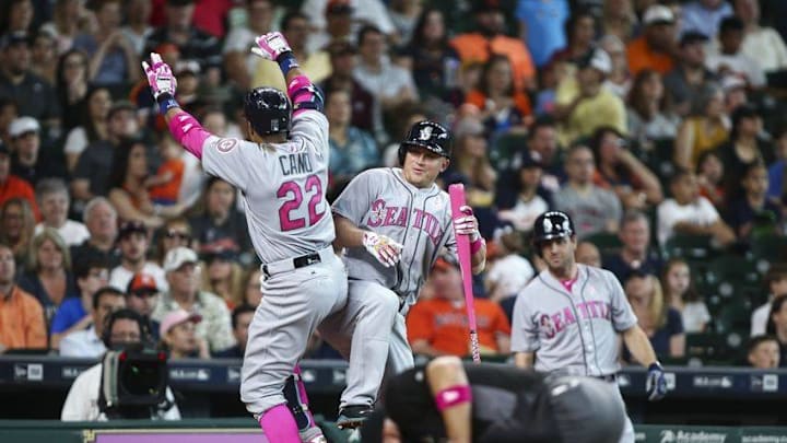 May 8, 2016; Houston, TX, USA; Seattle Mariners second baseman Robinson Cano (22) celebrates with third baseman Kyle Seager (15) after hitting a home run during the fourth inning against the Houston Astros at Minute Maid Park. Mandatory Credit: Troy Taormina-USA TODAY Sports