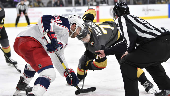 LAS VEGAS, NEVADA – JANUARY 11: William Karlsson #71 of the Vegas Golden Knights faces off with Boone Jenner #38 of the Columbus Blue Jackets during the second period at T-Mobile Arena on January 11, 2020 in Las Vegas, Nevada. (Photo by Jeff Bottari/NHLI via Getty Images)