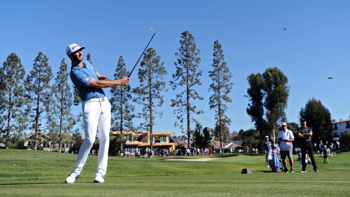 Feb 17, 2018; Pacific Palisades, CA, USA; Dustin Johnson plays his third shot on the 11th hole during the third round of the Genesis Open golf tournament at Riviera Country Club. Mandatory Credit: Orlando Ramirez-USA TODAY Sports
