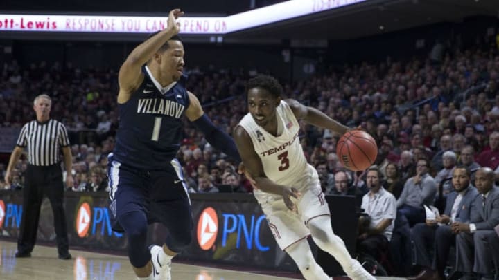 PHILADELPHIA, PA - DECEMBER 13: Shizz Alston Jr. #3 of the Temple Owls drives to the basket against Jalen Brunson #1 of the Villanova Wildcats at the Liacouras Center on December 13, 2017 in Philadelphia, Pennsylvania. (Photo by Mitchell Leff/Getty Images)