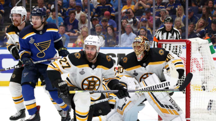 ST. LOUIS, MISSOURI - JUNE 09: John Moore #27 of the Boston Bruins defends the crease area during the third period of Game Six of the 2019 NHL Stanley Cup Final at Enterprise Center on June 09, 2019 in St Louis, Missouri. (Photo by Dave Sandford/NHLI via Getty Images)