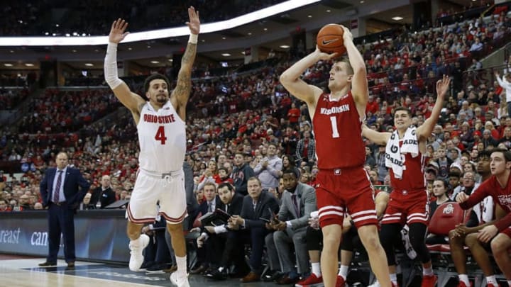 COLUMBUS, OHIO - JANUARY 03: Brevin Pritzl #1 of the Wisconsin Badgers shots a three point shot while being guarded by Duane Washington Jr. #4 of the Ohio State Buckeyes during the second half at Value City Arena on January 03, 2020 in Columbus, Ohio. (Photo by Justin Casterline/Getty Images)