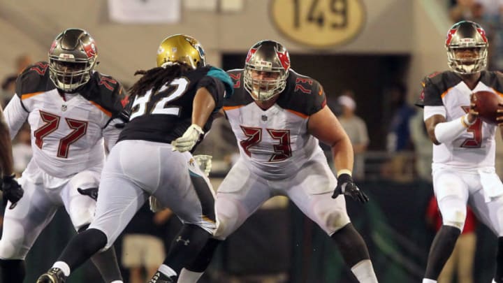 JACKSONVILLE, FL - AUG 17: J. R. Sweezy (73) of the Bucs sets up to block Sheldon Day (92) of the Jaguars during the NFL Preseason game between the Buccaneers at Jaguars on AUG 17, 2017 at EverBank Field in Jacksonville, Florida. (Photo by Cliff Welch/Icon Sportswire via Getty Images)