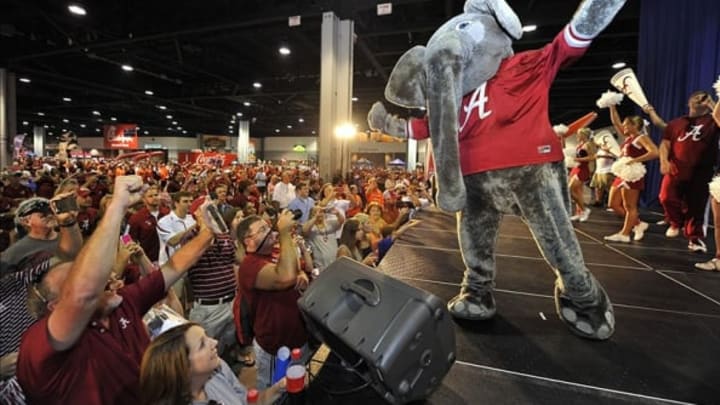 Aug 31, 2013; Atlanta, GA, USA; The Alabama Crimson Tide mascot performs for fans before the 2013 Chick-fil-A Kickoff game against the Virginia Tech Hokies at the Georgia Dome. Mandatory Credit: Paul Abell-USA TODAY Sports