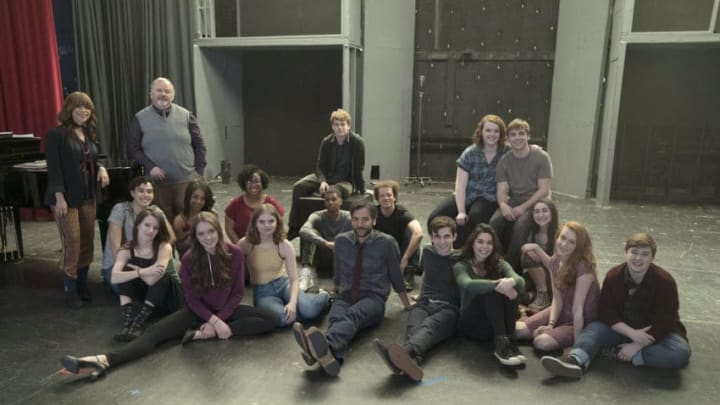 RISE -- Pilot -- Pictured: (l-r) Back row: Rosie Perez as Tracey Wolfe, Tom Riis Farrell as Mr. Baer, Rarmian Newton as Maashous Evers, Shannon Purser as Anabelle, Sean Grandillo as Jeremy Middle row: Joshua Grosso as Singer, Rachel Hilson as Harmony Curtis, Cheryl Bell as Singer, Brett Gray as Singer, Damon J. Gillespie as Robbie Thorne, Alexis Molnar as Singer Front row: Erin Kommor as Sasha, Amy Forsyth as Gwen Strickland, Katherine Reis as Jolene, Josh Radnor as Lou Mazzuchelli, Ted Sutherland as Simon Saunders, Auli'i Cravalho as Lilette Suarez, Caroline Pluta as Singer, Ellie Desautels as Michael Hallowell-- (Photo by: Peter Kramer/NBC)