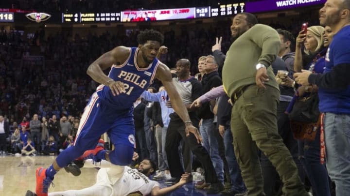 PHILADELPHIA, PA - NOVEMBER 21: Anthony Davis #23 of the New Orleans Pelicans shoots the ball and is fouled by Joel Embiid #21 of the Philadelphia 76ers in the final seconds of the fourth quarter at the Wells Fargo Center on November 21, 2018 in Philadelphia, Pennsylvania. NOTE TO USER: User expressly acknowledges and agrees that, by downloading and or using this photograph, User is consenting to the terms and conditions of the Getty Images License Agreement. (Photo by Mitchell Leff/Getty Images)