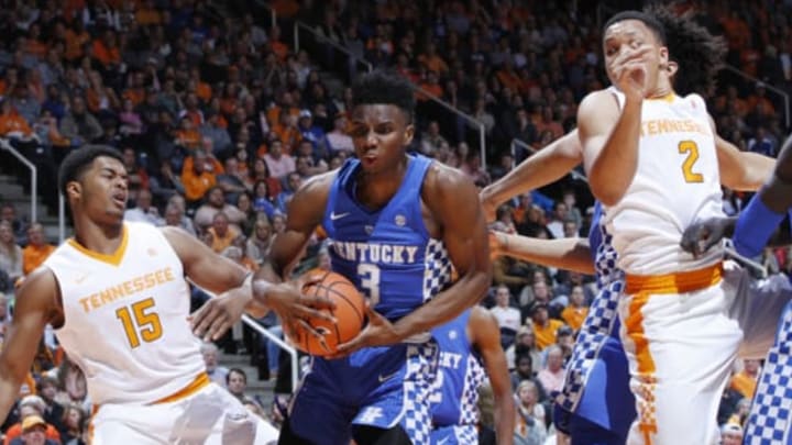 KNOXVILLE, TN – JANUARY 06: Hamidou Diallo #3 of the Kentucky Wildcats rebounds against Grant Williams #2 and Derrick Walker #15 of the Tennessee Volunteers in the first half of a game at Thompson-Boling Arena on January 6, 2018 in Knoxville, Tennessee. (Photo by Joe Robbins/Getty Images)