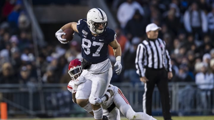STATE COLLEGE, PA – NOVEMBER 30: Pat Freiermuth #87 of the Penn State Nittany Lions carries the ball as Tre Avery #4 of the Rutgers Scarlet Knights defends during the first half at Beaver Stadium on November 30, 2019 in State College, Pennsylvania. (Photo by Scott Taetsch/Getty Images)