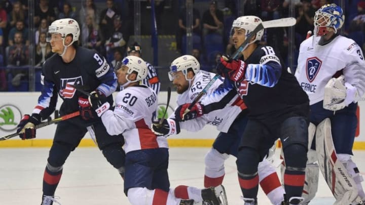 France's forward Eliot Berthon (2nd L) and France's defender Florian Chakiachvili (3rd L) block United States' forward Jack Eichel (L) and United States' forward Chris Kreider (2nd R) as France's goalkeeper Sebastian Ylonen (R) looks on during the IIHF Men's Ice Hockey World Championships Group A match between the US and France on May 12, 2019 in Kosice, Slovakia. (Photo by JOE KLAMAR / AFP) (Photo credit should read JOE KLAMAR/AFP/Getty Images)