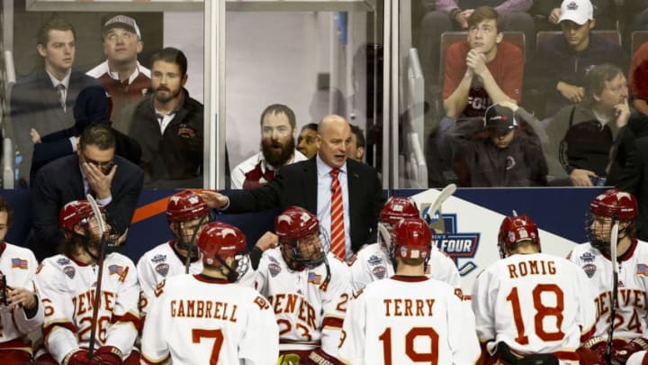 CHICAGO, IL - APRIL 08: Jim Montgomery head coach of the Denver Pioneers talks behind the bench during the 2017 NCAA Div I Men's Ice Hockey Championships at the United Center on April 8, 2017 in Chicago, Illinois. (Photo by Tim Nwachukwu/NCAA Photos via Getty Images)