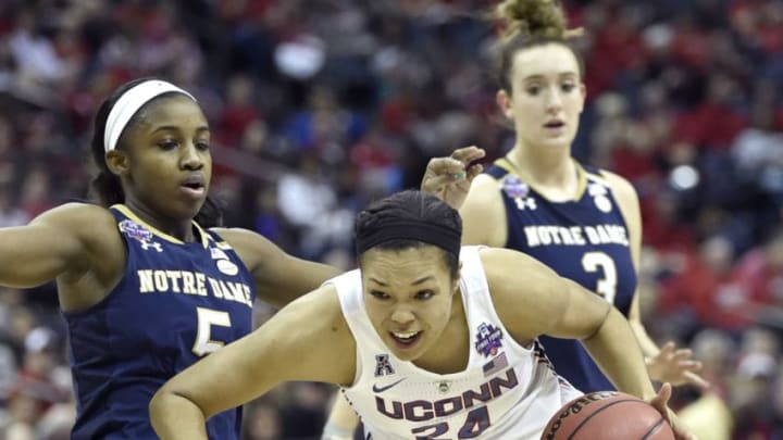 Connecticut’s Napheesa Collier (24) drives to the basket against Notre Dame’s Jackie Young (5) in an NCAA Tournament national semifinal at Nationwide Arena in Columbus, Ohio, on Friday, March 30, 2018. Notre Dame advanced, 91-89, in overtime. (Brad Horrigan/Hartford Courant/TNS via Getty Images)