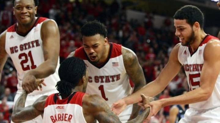 Jan 11, 2015; Raleigh, NC, USA; North Carolina State Wolfpack guard Trevor Lacey (1) congratulates guard Anthony