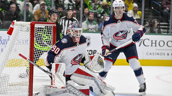 Oct 30, 2023; Dallas, Texas, USA; Columbus Blue Jackets goaltender Elvis Merzlikins (90) and defenseman Damon Severson (78) in action during the game between the Dallas Stars and the Columbus Blue Jackets at American Airlines Center. Mandatory Credit: Jerome Miron-USA TODAY Sports