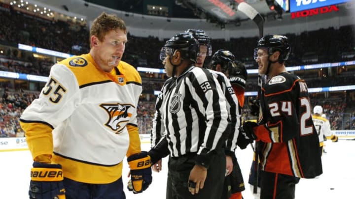 ANAHEIM, CALIFORNIA - MARCH 12: Cody McLeod #55 of the Nashville Predators stands up after being knocked to the ground during a fight with members of the Anaheim Ducks during the second period at Honda Center on March 12, 2019 in Anaheim, California. (Photo by Katharine Lotze/Getty Images)