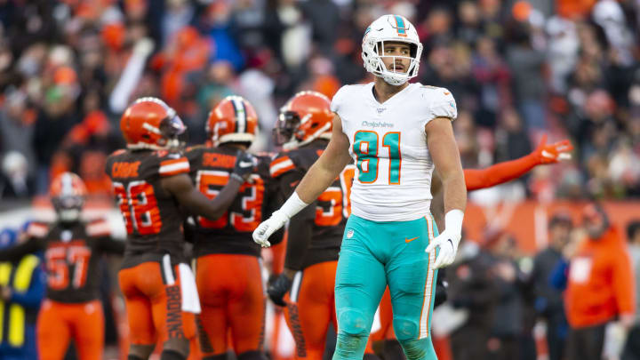 Nov 24, 2019; Cleveland, OH, USA; Miami Dolphins tight end Durham Smythe (81) walks back to the sideline following a Cleveland Browns interception on a pass intended for him during the fourth quarter at FirstEnergy Stadium. The Browns won 41-24. Mandatory Credit: Scott R. Galvin-USA TODAY Sports