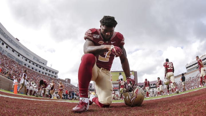 TALLAHASSEE, FL – OCTOBER 26: Runningback Cam Akers #3 of the Florida State Seminoles take a knee before the game against the Syracuse Orange at Doak Campbell Stadium on Bobby Bowden Field on October 26, 2019 in Tallahassee, Florida. The Seminoles defeated the Orange 35 to 17. (Photo by Don Juan Moore/Getty Images)