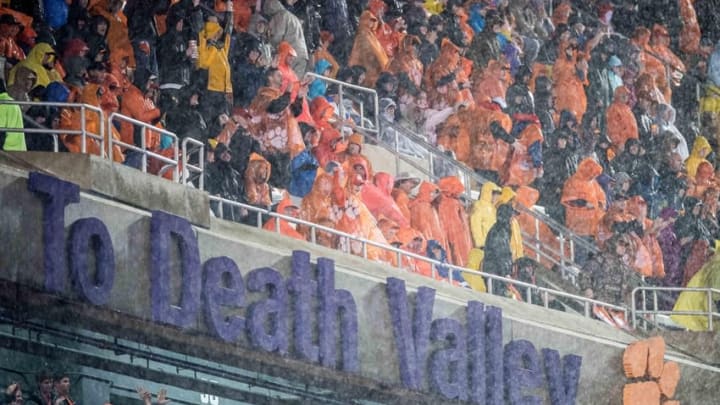 Oct 3, 2015; Clemson, SC, USA; Clemson fans cheer in the third quarter as rain falls in the game against the Notre Dame Fighting Irish at Clemson Memorial Stadium. The Clemson Tigers defeated Notre Dame 24-22. Mandatory Credit: Matt Cashore-USA TODAY Sports