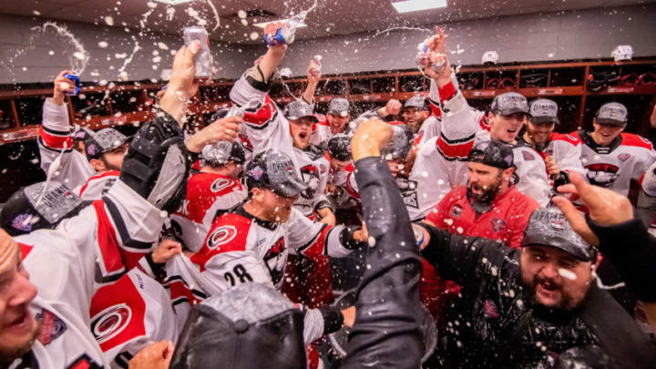 ROSEMONT, IL - JUNE 08: The Charlotte Checkers celebrate in the locker room after game five of the AHL Calder Cup Finals against the Chicago Wolves on June 8, 2019, at the Allstate Arena in Rosemont, IL. (Photo by Patrick Gorski/Icon Sportswire via Getty Images)