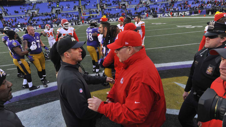 BALTIMORE, MD – DECEMBER 20: Head coach John Harbaugh of the Baltimore Ravens and head coach Andy Reid of the Kansas City Chiefs meet at midfield after the game between the Baltimore Ravens and the Kansas City Chiefs at M&T Bank Stadium on December 20, 2015 in Baltimore, Maryland. The Chiefs defeated the Ravens 34-14. (Photo by Larry French/Getty Images)