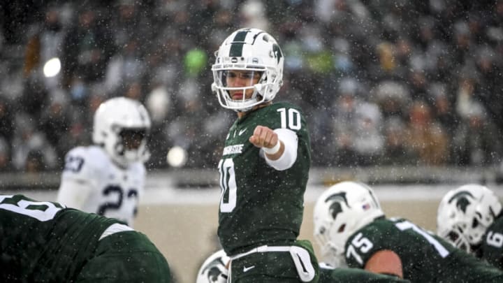 EAST LANSING, MICHIGAN - NOVEMBER 27: Payton Thorne #10 of the Michigan State Spartans signals to his team against the Penn State Nittany Lions at Spartan Stadium on November 27, 2021 in East Lansing, Michigan. (Photo by Nic Antaya/Getty Images)
