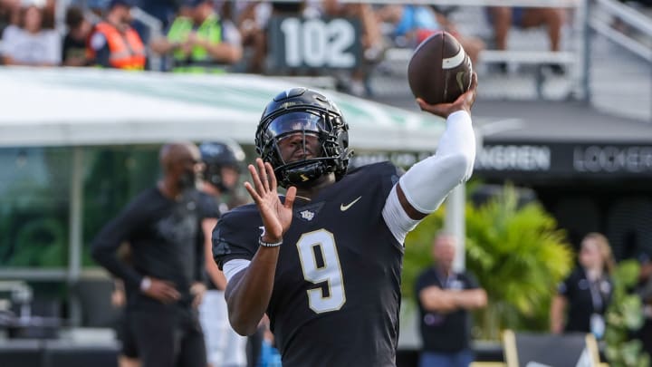 Sep 16, 2023; Orlando, Florida, USA; UCF Knights quarterback Timmy McClain (9) warms up before the game against the Villanova Wildcats at FBC Mortgage Stadium. Mandatory Credit: Mike Watters-USA TODAY Sports