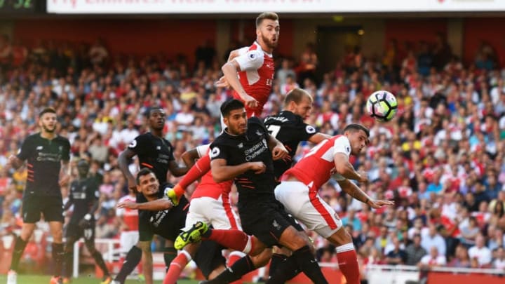 LONDON, ENGLAND - AUGUST 14: Calum Chambers of Arsenal scores his team's third goal during the Premier League match between Arsenal and Liverpool at Emirates Stadium on August 14, 2016 in London, England. (Photo by Mike Hewitt/Getty Images)