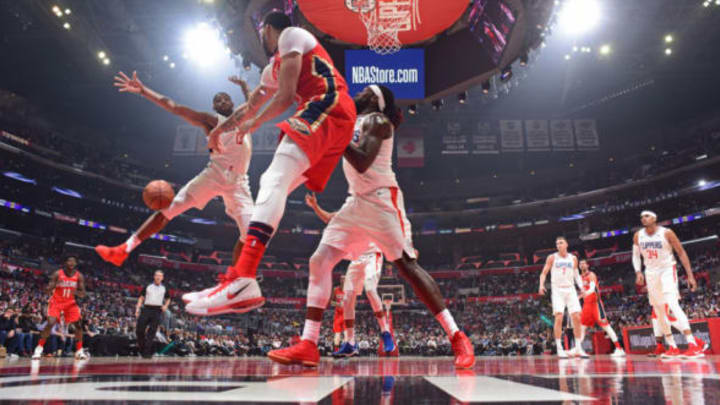 LOS ANGELES, CA – APRIL 9: Anthony Davis #23 of the New Orleans Pelicans passes the ball around Sindarius Thornwell #0 of the LA Clippers on April 9, 2018 at STAPLES Center in Los Angeles, California. NOTE TO USER: User expressly acknowledges and agrees that, by downloading and/or using this Photograph, user is consenting to the terms and conditions of the Getty Images License Agreement. Mandatory Copyright Notice: Copyright 2018 NBAE (Photo by Andrew D. Bernstein/NBAE via Getty Images)