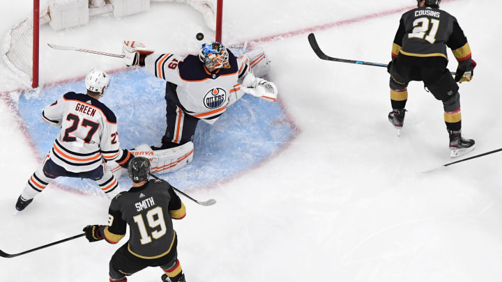 Nick Cousins of the Vegas Golden Knights scores a third-period power-play goal against Mikko Koskinen #19 of the Edmonton Oilers during their game at T-Mobile Arena.
