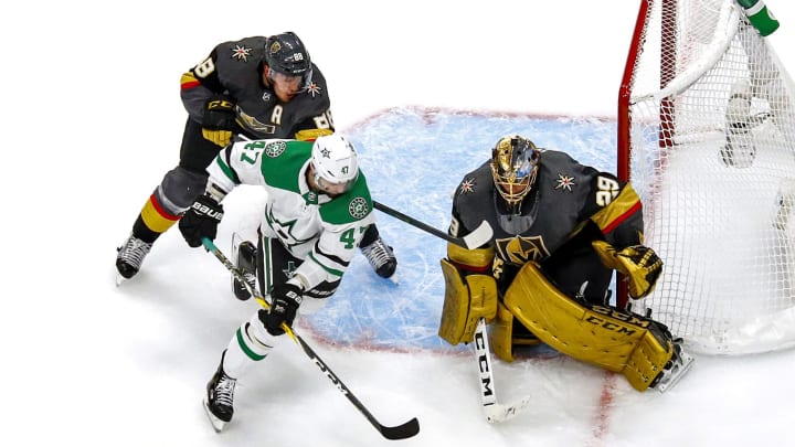 Alexander Radulov #47 of the Dallas Stars is defended by Nate Schmidt #88 of the Vegas Golden Knights as Marc-Andre Fleury #29 tends net