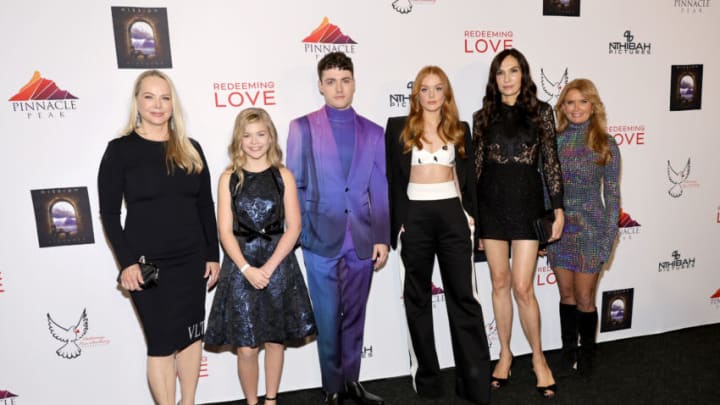 LOS ANGELES, CALIFORNIA - JANUARY 13: (L-R) Cindy Bond, Livi Birch, Tom Lewis, Abigail Cowen, Famke Janssen, and Roma Downey attend the Los Angeles special screening of Universal's "Redeeming Love" at Directors Guild of America on January 13, 2022 in Los Angeles, California. (Photo by Amy Sussman/Getty Images)