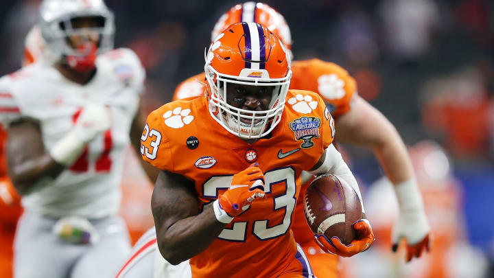 NEW ORLEANS, LOUISIANA – JANUARY 01: Lyn-J Dixon #23 of the Clemson Tigers carries the ball against the Ohio State Buckeyes in the second quarter during the College Football Playoff semifinal game at the Allstate Sugar Bowl at Mercedes-Benz Superdome on January 01, 2021 in New Orleans, Louisiana. (Photo by Kevin C. Cox/Getty Images)