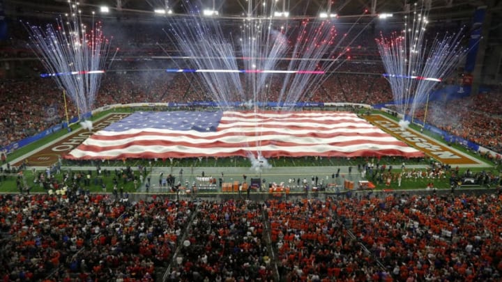 GLENDALE, ARIZONA - DECEMBER 28: The American flag is displayed over the field prior to the College Football Playoff Semifinal between the Ohio State Buckeyes and the Clemson Tigers at the Playstation Fiesta Bowl at State Farm Stadium on December 28, 2019 in Glendale, Arizona. (Photo by Ralph Freso/Getty Images)