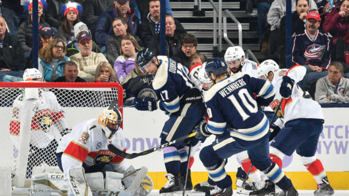 COLUMBUS, OH - NOVEMBER 15: Players from both teams battle for a loose puck in front of goaltender Roberto Luongo #1 of the Florida Panthers during the second period of a game between the Florida Panthers and the Columbus Blue Jackets on November 15, 2018 at Nationwide Arena in Columbus, Ohio. (Photo by Jamie Sabau/NHLI via Getty Images)