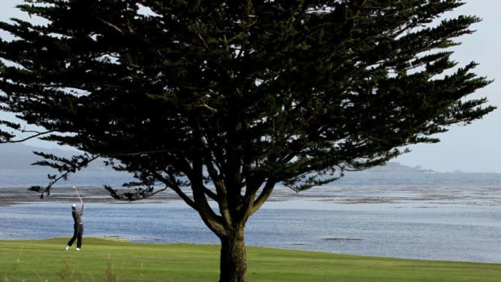 PEBBLE BEACH, CA - JUNE 17: Tiger Woods hits a shot on the 18th hole during the first round of the 110th U.S. Open at Pebble Beach Golf Links on June 17, 2010 in Pebble Beach, California. (Photo by Jeff Gross/Getty Images)
