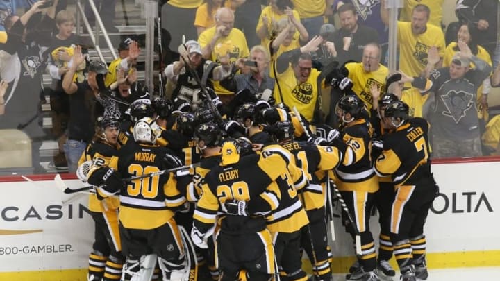 Jun 1, 2016; Pittsburgh, PA, USA; Pittsburgh Penguins left wing Conor Sheary (43) celebrates with teammates after scoring the game-winning goal against the San Jose Sharks in the overtime period of game two of the 2016 Stanley Cup Final at Consol Energy Center. Mandatory Credit: Charles LeClaire-USA TODAY Sports