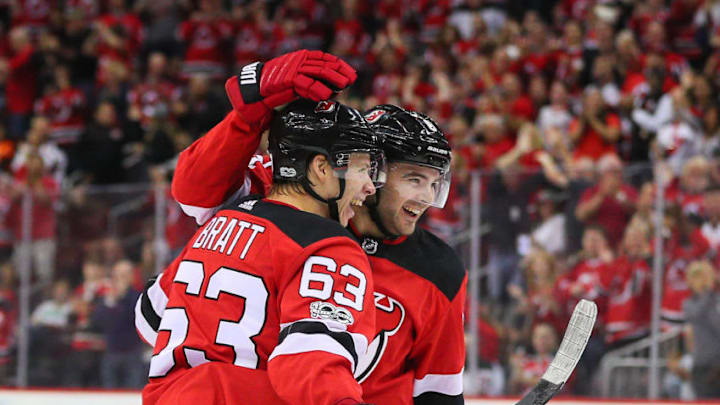 NEWARK, NJ - OCTOBER 07: New Jersey Devils left wing Jesper Bratt (63) celebrates with New Jersey Devils defenseman Will Butcher (8) after scoring his first NHL Goal during the second period of the National Hockey League game between the New Jersey Devils and the Colorado Avalanche on October 7, 2017, at the Prudential Center in Newark, NJ. (Photo by Rich Graessle/Icon Sportswire via Getty Images)