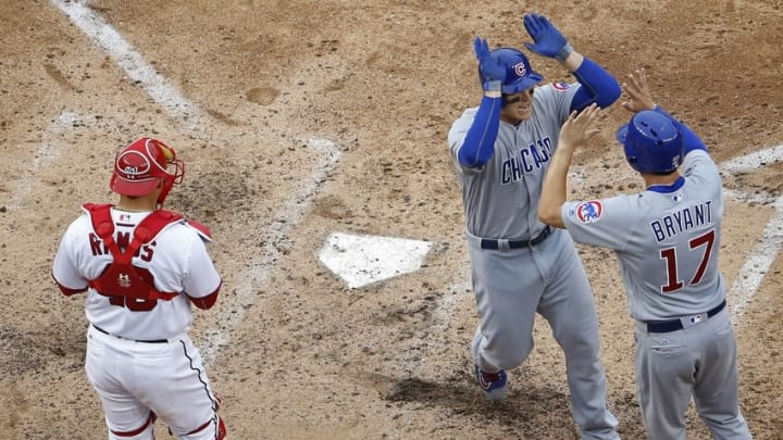 Jun 15, 2016; Washington, DC, USA; Chicago Cubs first baseman Anthony Rizzo (44) celebrates with Cubs third baseman Kris Bryant (17) after hitting a two run home run against the Washington Nationals in the ninth inning at Nationals Park. The Nationals won 5-4 in twelve innings. Mandatory Credit: Geoff Burke-USA TODAY Sports