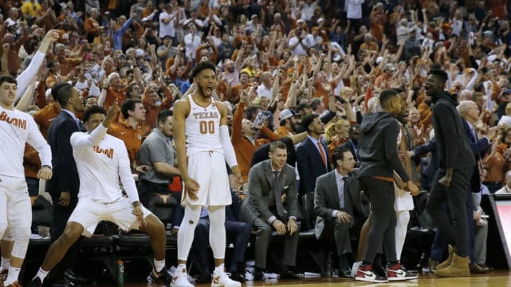 AUSTIN, TX - MARCH 3: The Texas Longhorns bench reacts as the Texas Longhorns defeated the West Virginia Mountaineers 87-79 in overtime at the Frank Erwin Center on March 3, 2018 in Austin, Texas. (Photo by Chris Covatta/Getty Images)