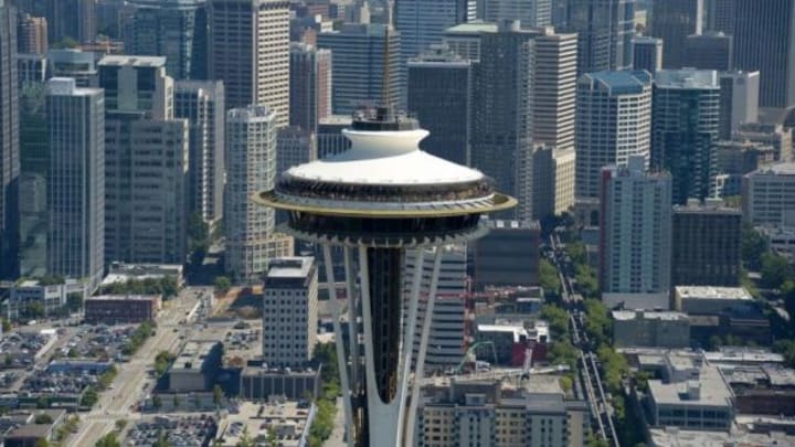 Aug 6, 2013; Seattle, WA, USA; Aerial view of the Space Needle and the downtown Seattle skyline. Mandatory Credit: Kirby Lee-USA TODAY Sports