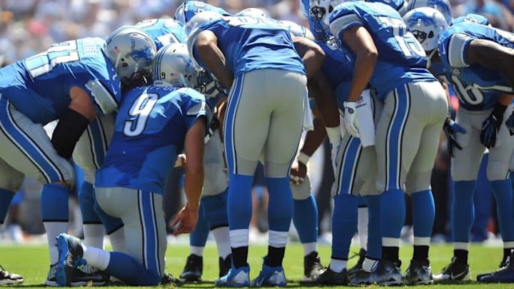 Sep 13, 2015; San Diego, CA, USA; Detroit Lions quarterback Matthew Stafford (9) and the rest of the offense huddle during the game against the San Diego Chargers at Qualcomm Stadium. San Diego won 33-28. Mandatory Credit: Orlando Ramirez-USA TODAY Sports