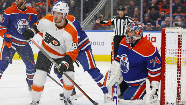 Feb 21, 2023; Edmonton, Alberta, CAN; Philadelphia Flyers forward Joel Farabee (86) tries to screen Edmonton Oilers goaltender Stuart Skinner (74) during the second period at Rogers Place. Mandatory Credit: Perry Nelson-USA TODAY Sports