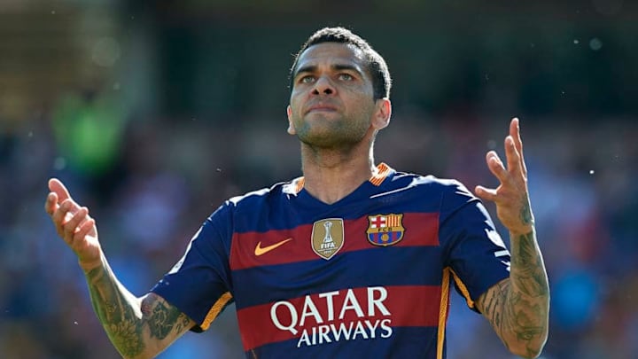 GRANADA, SPAIN - MAY 14: Daniel Alves of FC Barcelona reacts during the La Liga match between Granada CF and FC Barcelona at Estadio Nuevo Los Carmenes on May 14, 2016 in Granada, Spain. (Photo by Manuel Queimadelos Alonso/Getty Images)