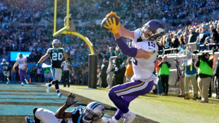 CHARLOTTE, NC – DECEMBER 10: Adam Thielen #19 of the Minnesota Vikings attempts a catch against Kevon Seymour #27 of the Carolina Panthers in the second quarter during their game at Bank of America Stadium on December 10, 2017 in Charlotte, North Carolina. (Photo by Grant Halverson/Getty Images)