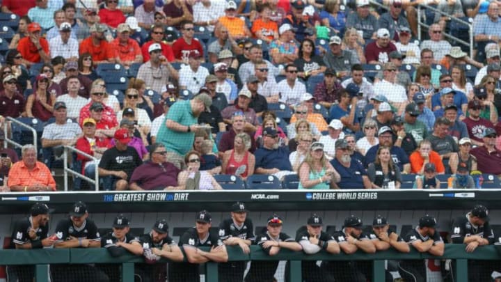 The MSU bench watches the game in the bottom of the first inning. Mississippi State defeated Auburn in the opening round of the NCAA College World Series on Sunday, June 16.2019 at TD Ameritrade Park in Omaha. Photo by Keith WarrenMsu Auburn College World Series
