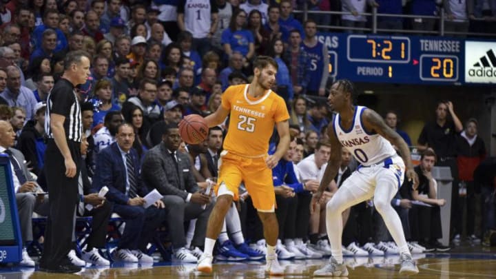 LAWRENCE, KANSAS - JANUARY 25: Santiago Vescovi #25 of the Tennessee Volunteers in action against Marcus Garrett #0 of the Kansas Jayhawks at Allen Fieldhouse on January 25, 2020 in Lawrence, Kansas. (Photo by Ed Zurga/Getty Images)