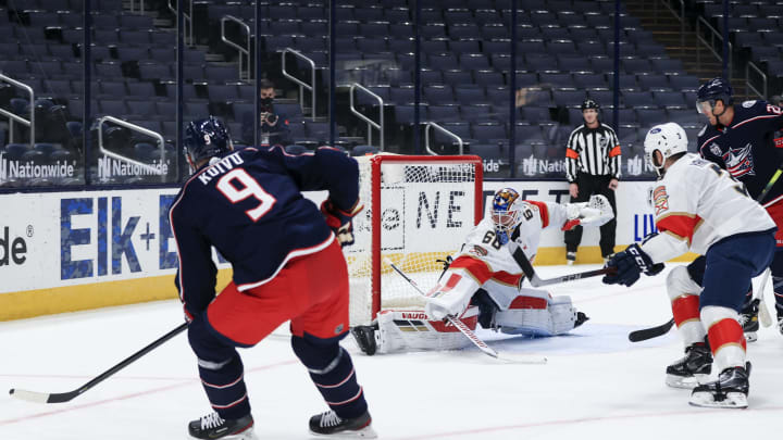 Jan 28, 2021; Columbus, Ohio, USA; Columbus Blue Jackets center Mikko Koivu (9) scores a goal against Florida Panthers goaltender Chris Driedger (60) in the first period at Nationwide Arena. Mandatory Credit: Aaron Doster-USA TODAY Sports
