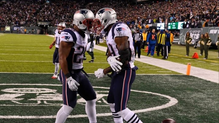 Nov 27, 2016; East Rutherford, NJ, USA; New England Patriots wide receiver Malcolm Mitchell (19) celebrates with running back LeGarrette Blount (29) after scoring the game winning touchdown against the New York Jets during the fourth quarter at MetLife Stadium. Mandatory Credit: Robert Deutsch-USA TODAY Sports