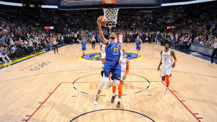 DENVER, CO - DECEMBER 14: Jamal Murray #27 of the Denver Nuggets drives to the basket during the game against the Oklahoma City Thunder on December 14, 2018 at the Pepsi Center in Denver, Colorado. NOTE TO USER: User expressly acknowledges and agrees that, by downloading and/or using this Photograph, user is consenting to the terms and conditions of the Getty Images License Agreement. Mandatory Copyright Notice: Copyright 2018 NBAE (Photo by Bart Young/NBAE via Getty Images)
